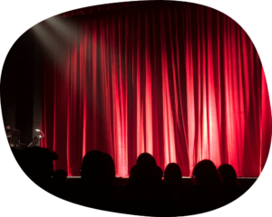 red theatre closed curtains.