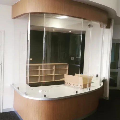a curved counter with a box on top of it.